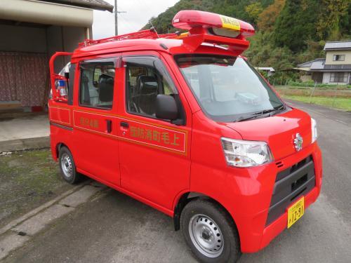 赤い小型動力ポンプ付軽積載車の消防車の写真